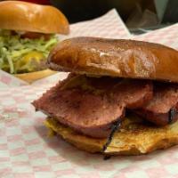 Hot Link Sandwich · House Made Hot Links Served on A Toasted Brioche Bun With Your Choice Of Pickles, Onions, Mu...
