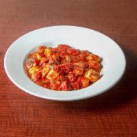 Gnocchi Pomodoro Pasta · Gnocchi tossed in roasted garlic, fresh basil, and San Marzano tomatoes.