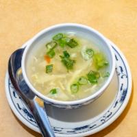Egg Drop Soup · A Tsing Tsao favorite, this soup has a savory clear broth and softly-cooked eggs.