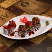 C20. Kagura Roll · Shrimp tempura, seaweed salad, crabmeat, salmon topped with avocado and tuna. Spicy.