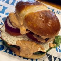 Grecian Beefteki Burger · 1/3 pound beef patty seasoned to perfection with feta cheese served on a brioche bun with le...