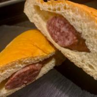 Sausage Kolache · Fresh made bread with the perfect sausage inside!