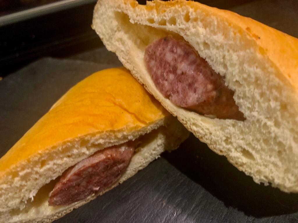Sausage Kolache · Fresh made bread with the perfect sausage inside!