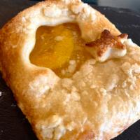 Peach Cobbler Pocket · Like a pie accept all the goodness wrapped in a golden baked croissant dough!