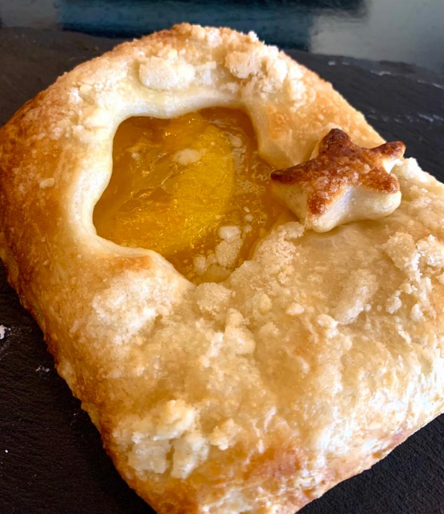 Peach Cobbler Pocket · Like a pie accept all the goodness wrapped in a golden baked croissant dough!