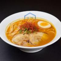 Spicy Curry Ramen · Seasonal limited edition! For curry lovers. Vegetable broth, curry powder, sesame paste, gri...