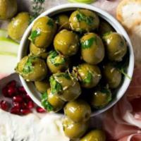 Marinated olive ( zeitoon parvardeh ) · Olive, pomegranate, olive oil, vegetables , angelica, walnut , garlic