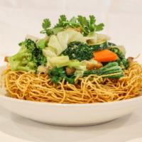 N22. Crispy Chowmein · Crispy wheat noodle with vegetables, organic tofu, soy protein and mushroom, stir-fried in g...