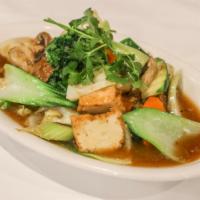 N22. Crispy Chowfun · Crispy rice noodle with vegetables, organic tofu, soy protein and mushroom, stir-fried in ga...