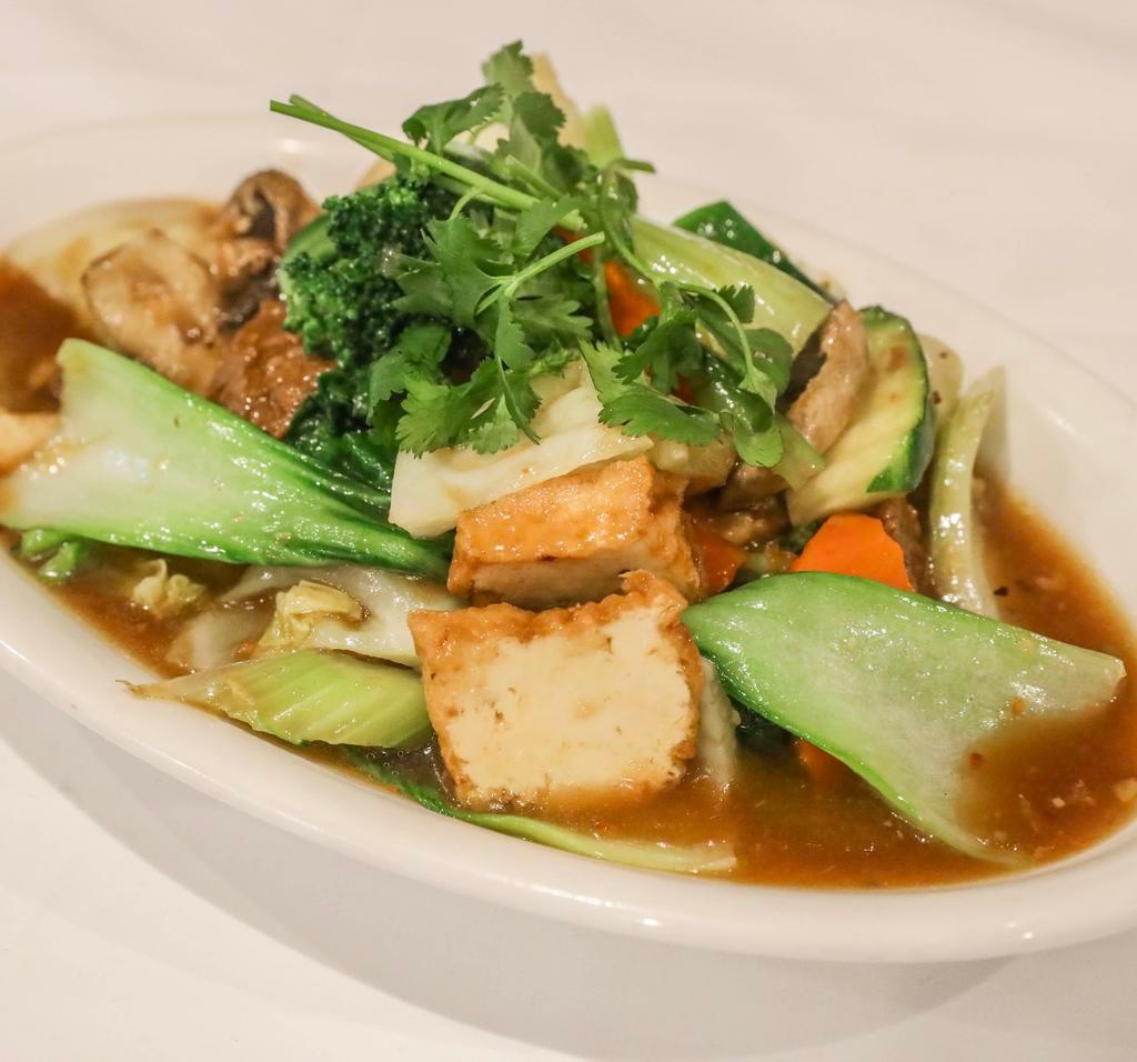 Vegetable Deluxe · Combination of fresh vegetables stir-fried with organic tofu, soy protein and mushroom in garlic sauce.
