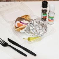 GYRO · LAMB & BEEF, TZATZIKI SAUCE, TOMATO, ONION, ON PITA BREAD, OLIVES & PEPPERS ON THE SIDE