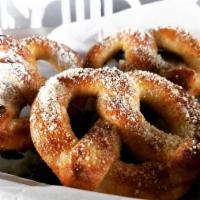 Pretzels · 3 House Made Pretzels served with Beer Cheese.  Choose either Parmesan or Salted.