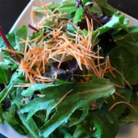 House Salad · Mixed greens and house ginger dressing.