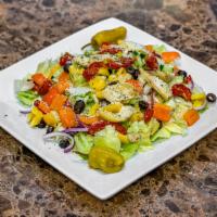 Veggie Salad · Iceberg, tricolor peppers, roasted tomatoes, mozzarella cheese, cucumbers, artichoke.