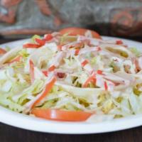 House Salad · Lettuce, tomato, onion, parsley, pickle turnip and tahini. Served with warm pita bread.