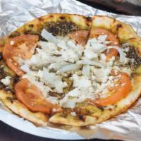 Plain Bitzza · Tomatoes, onion and feta cheese. Middle Eastern pizza topped with zaatar bread (pita with th...