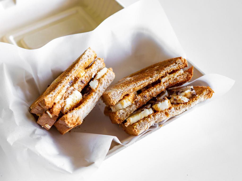 Peanut Butter Sandwich · Peanut butter, banana, honey and cacao nibs.