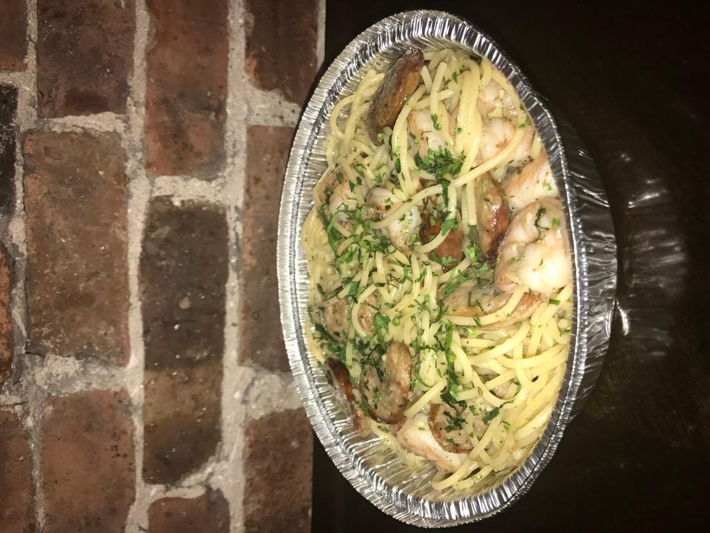 Shrimp scampi · Delicious shrimp scampi with choice of spaghetti or ziti
