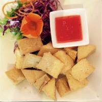 9.Fried Tofu · Crispy fried tofu. Served with sweet and sour sauce.