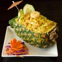 41. Hawaiian Fried Rice ·  Stir fried shrimp, chicken, pineapples, onions, eggs, green peas, cashew nuts and  curry po...