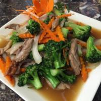 58. Broccoli · Broccoli, carrots and onions, sauteed in homemade house special sauce. Served with steamed j...