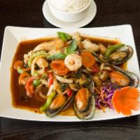61. Ocean Seafood · Stir fried shrimp, fish, scallops, calamari and mussels, carrots, onions, mushrooms, bell pe...