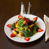 Tropical Salad · Mix greens, mango, mix berries, Gorgonzola cheese and honey lemon vinaigrette.