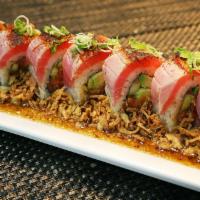 Cajun Tuna Roll · In: spicy tuna, avocado, and cucumber. Out: seared Cajun, tuna, green onion, crispy onion, a...