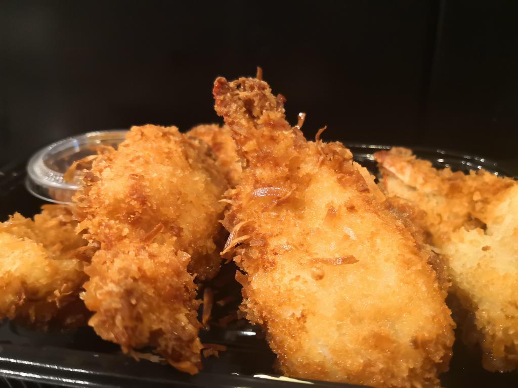 5 Pieces Crispy Coconut Shrimp  · Golden sweet, crispy coconut crusted shrimp served with our homemade sweet and spicy pineapple sauce.