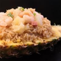 Makana House fried rice · Hawaiian style rice stir-fried in our homemade special sauce  with pineapple, shrimp, spam, ...