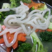 Udon Noodles Miso Soup and Broccoli  · Japanese udon noodles with broccoli, shiitake mushrooms, onion, carrots and scallion.  