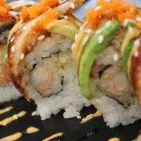 8 Pieces Tsunami Roll · Tempura shrimp, cucumber topped with eel, avocado and masago.