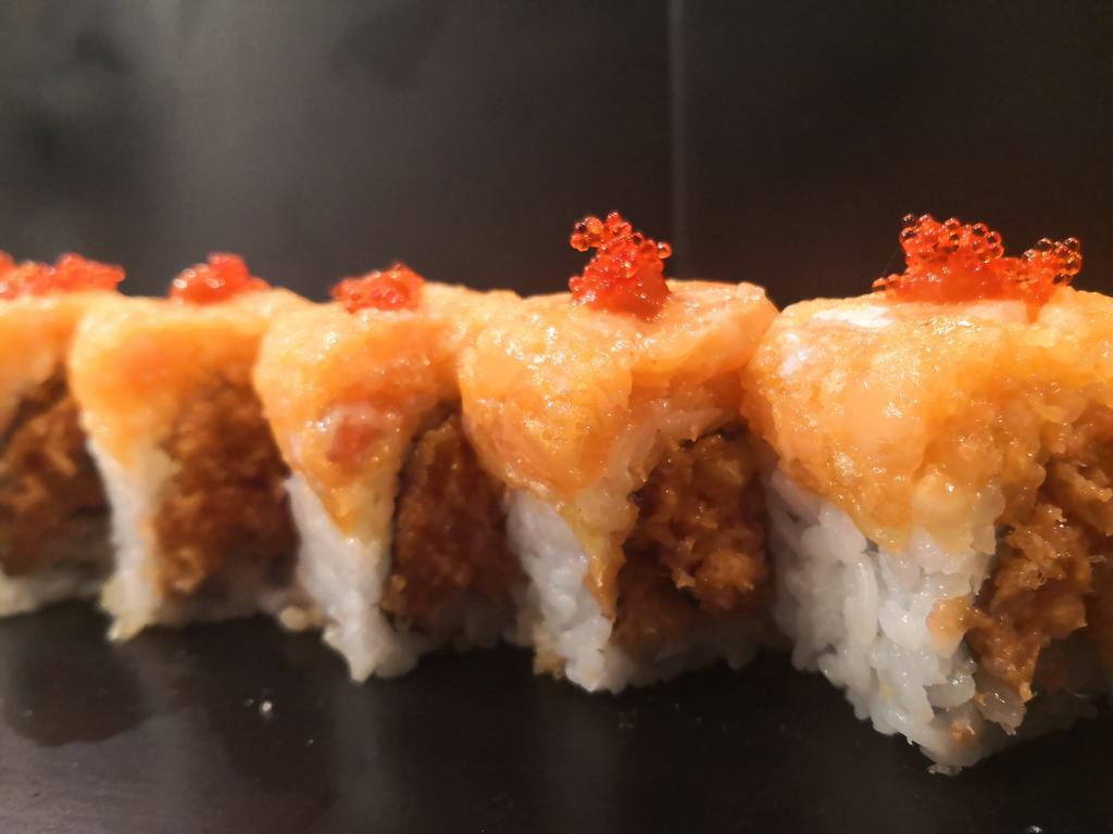 8 Pieces Island Girl Roll · Spicy tuna and salmon, tempura flakes with spicy yellowtail and scallion.