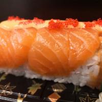 8 Pieces Sunrise Roll · Spicy crunchy salmon, avocado, wrapped in salmon with masago.