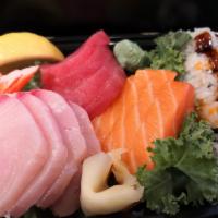 Sashimi Entree · 14 Pieces of sashimi and one regular roll of your choice.