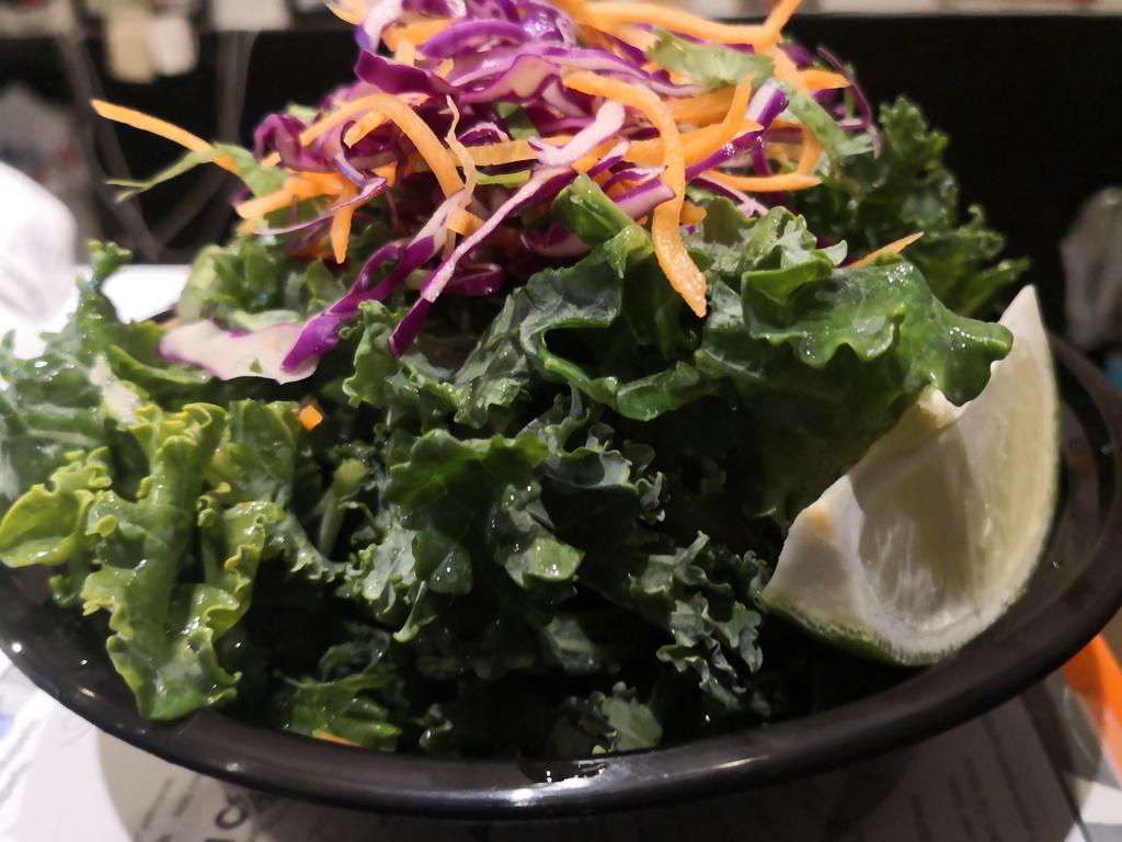 Kale Salad · Kale, baby spinach, shredded purple cabbage and carrots.