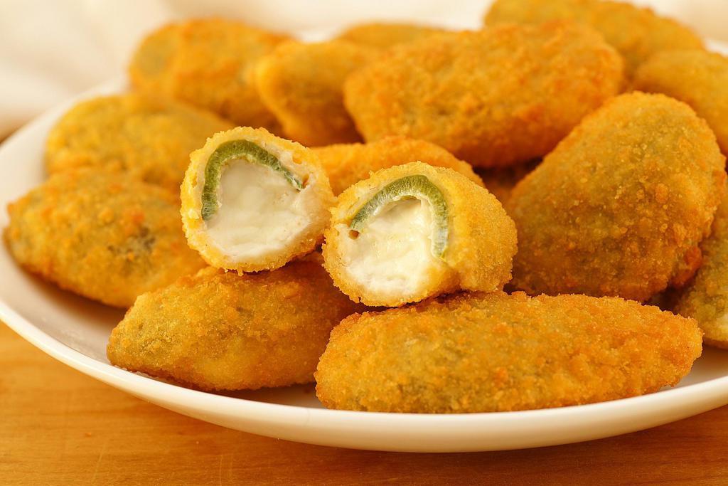  Jalapeno Poppers · 6 Large Cream Cheese Stuffed Jalapeno's breaded to  a light crisp served with a side of marinara sauce