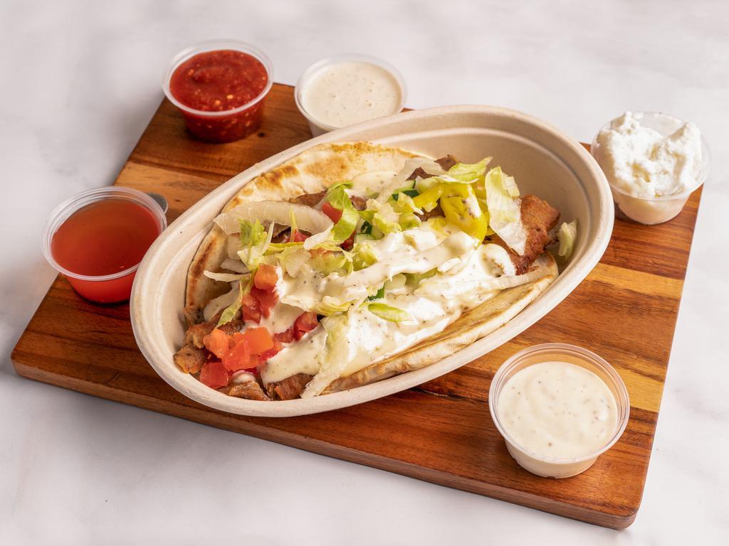 Pita Meal · Build your authentic Greek pita with choice of protein, fresh veggies and sauces it up