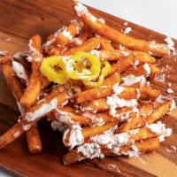 Greek Fries · Fries covered with banana pepperd, feta cheese and our house Tajikistan sauce.