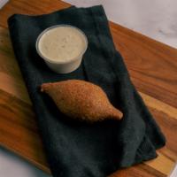 Kibbeh (1) · Cracked wheat and ground beef shell filled of minced onions, and finely ground lean beef wit...