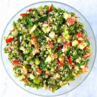 Tabouli (Tabbouleh) Salad · Finely chopped parsley, mint, cucumbers, onions, tomatoes,
Lightly covered with bulgar wheat...