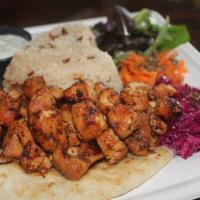 Chicken Shawarma (Spicy) · Seasoned chicken grilled in front of spit fire.