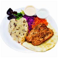 Grilled Salmon  · Wild caught salmon marinated with special house sauce.