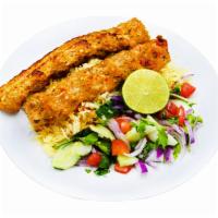 Chicken Seekh Kabob · Two skewers of minced chicken with a variety of spices.