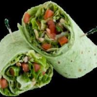 Veggie Wrap · Spinach flavored bread with veggies topped with our signature red cabbage and shredded carro...