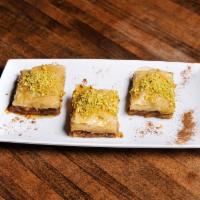 Baklava · Sweet pastry made of layers of filo dough filled with chopped nuts, sweetened with specializ...