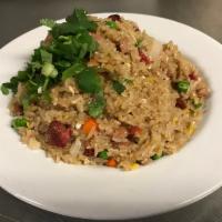 BBQ Pork Fried Rice · Must-try fried rice! Well-prepared with rice, carrots, peas, BBQ pork, onion, garnished with...