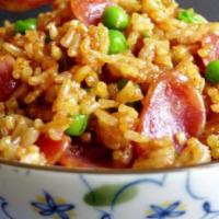 Chinese sausage fried rice  · House special!!! So flavorful fried rice with pork sausage, mixed peas and carrots & garnish...