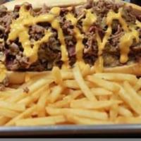 13. Pastrami Cheesesteak · Steak, pastrami, sauteed onion and provolone cheese topped with Fred's house mustard.