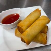 A1 Egg Rolls · Vegetarian deep fried rolls wrapped with vegetables and served with sweet chili sauce.